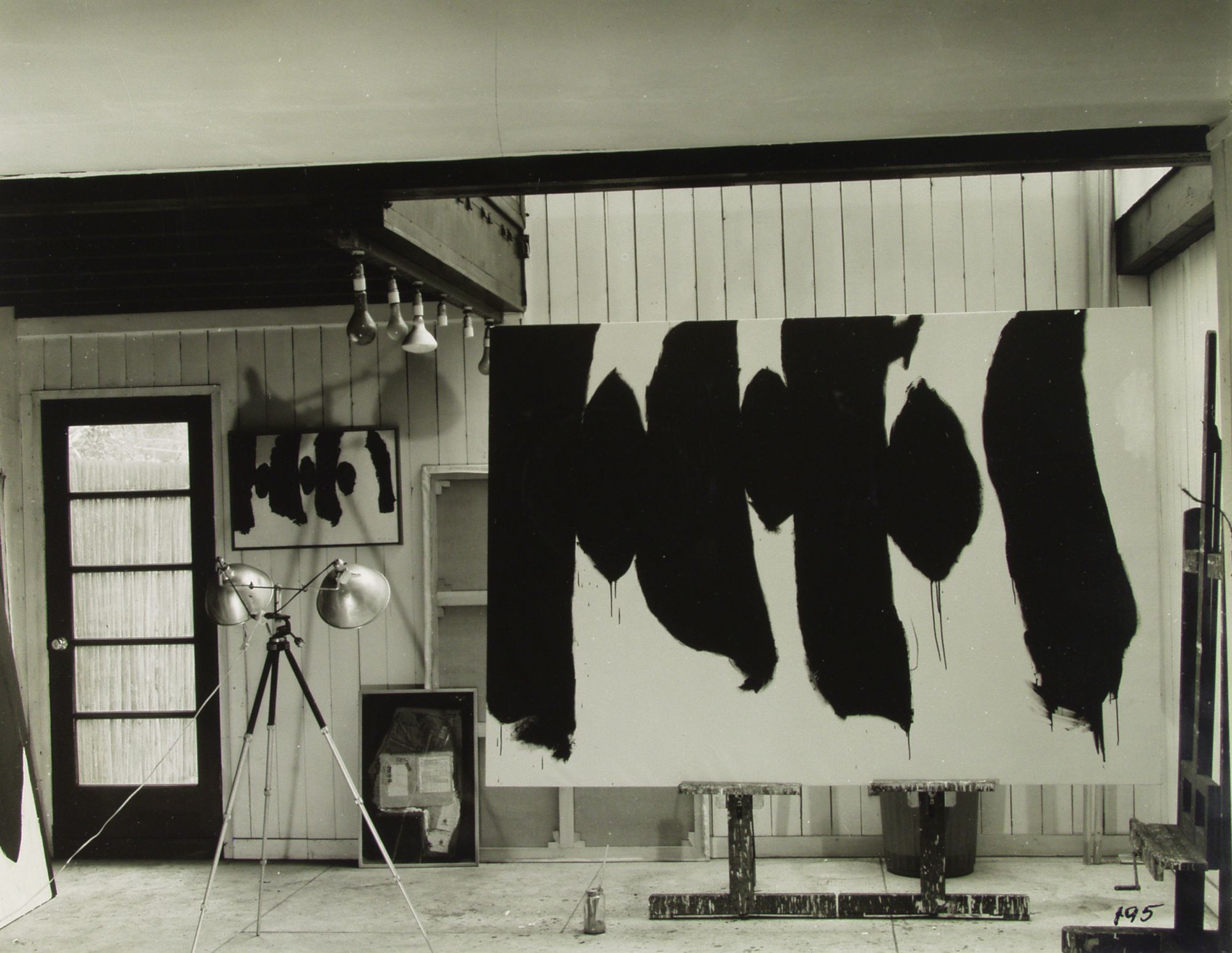 Motherwell’s studio at 173 E. 94th Street, New York. From left to right: Spanish Elegy XIV (Palamos) and an early state of Diary of a Painter, 1958