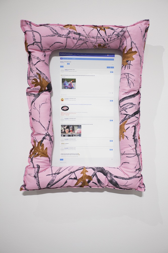 A print of a social media feed with a frame made of cushion