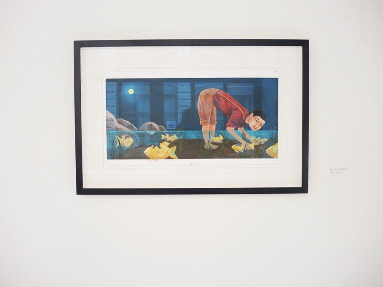 An installation image containing a framed painting