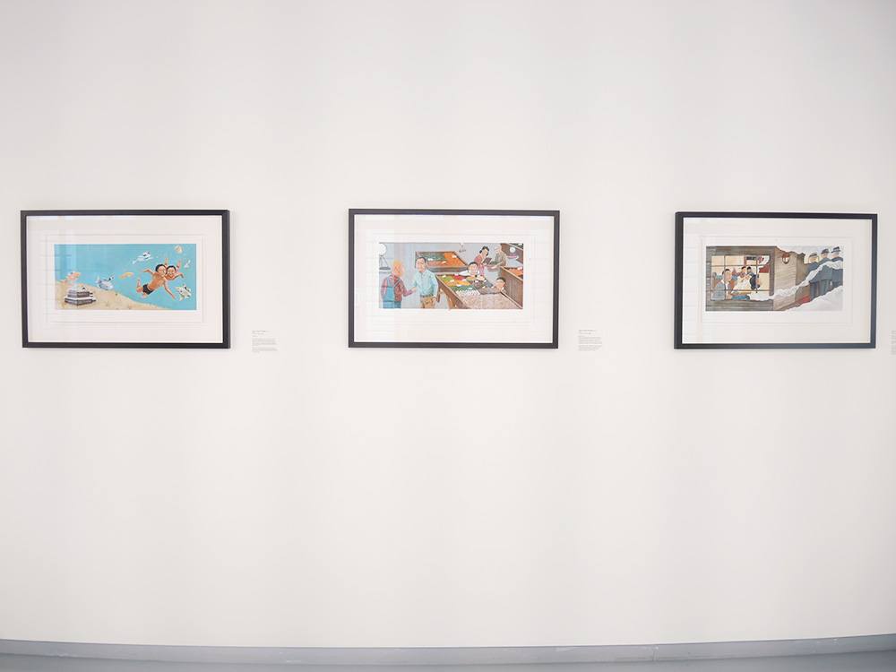 An installation image containing multiple framed paintings