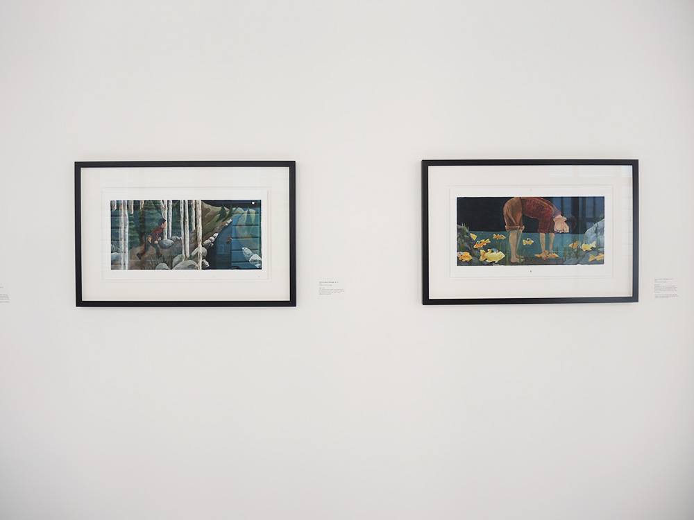 An installation image containing multiple framed paintings