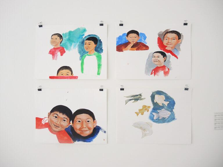 Four pages with portraits of children and fish