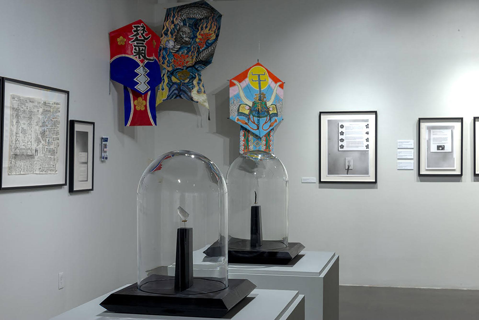 An installation view showing many artworks