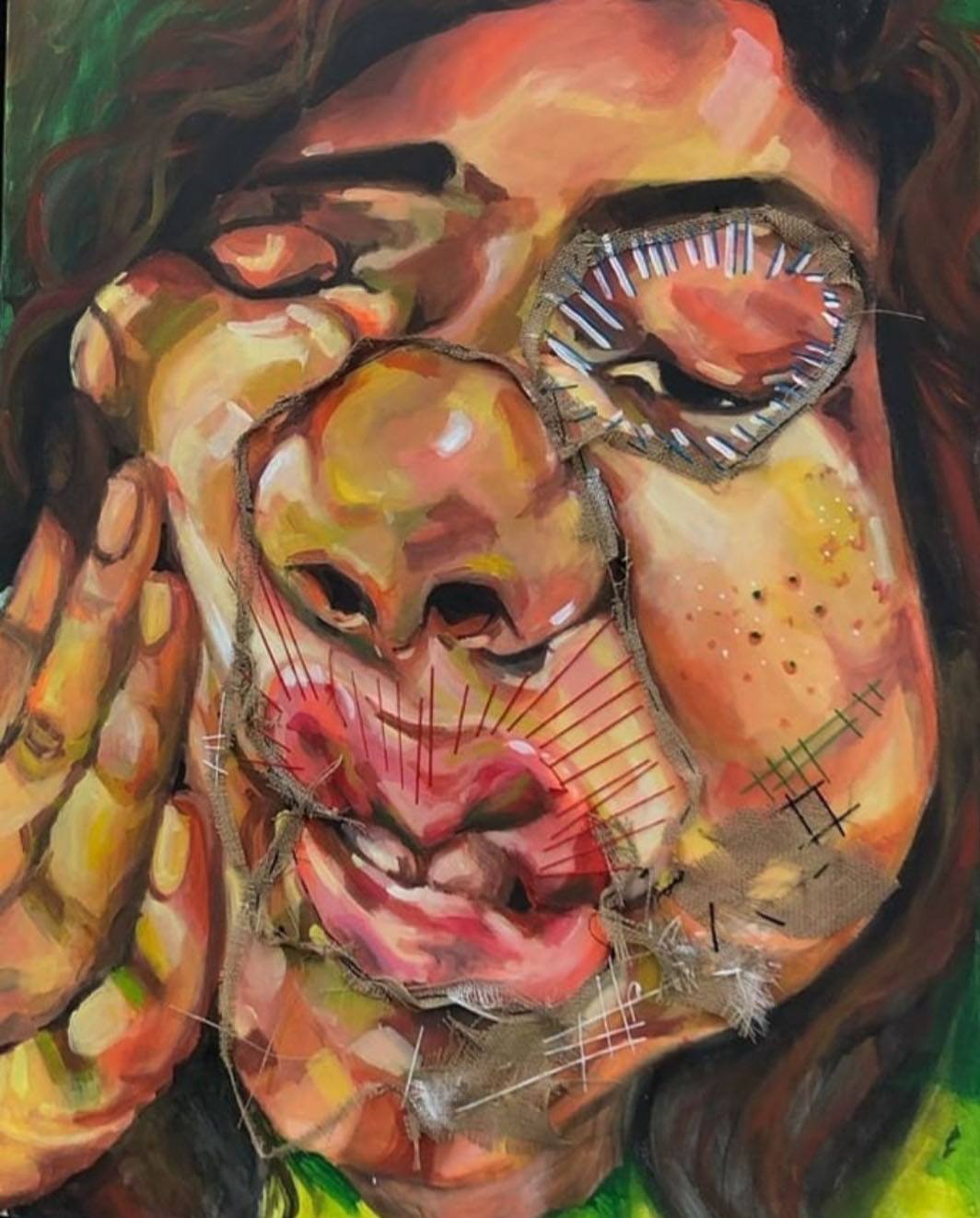 A painting of a face with stitching