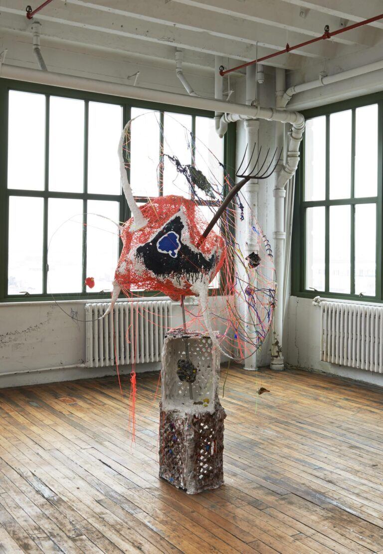 An installation image featuring a sculpture by Michelle Segre