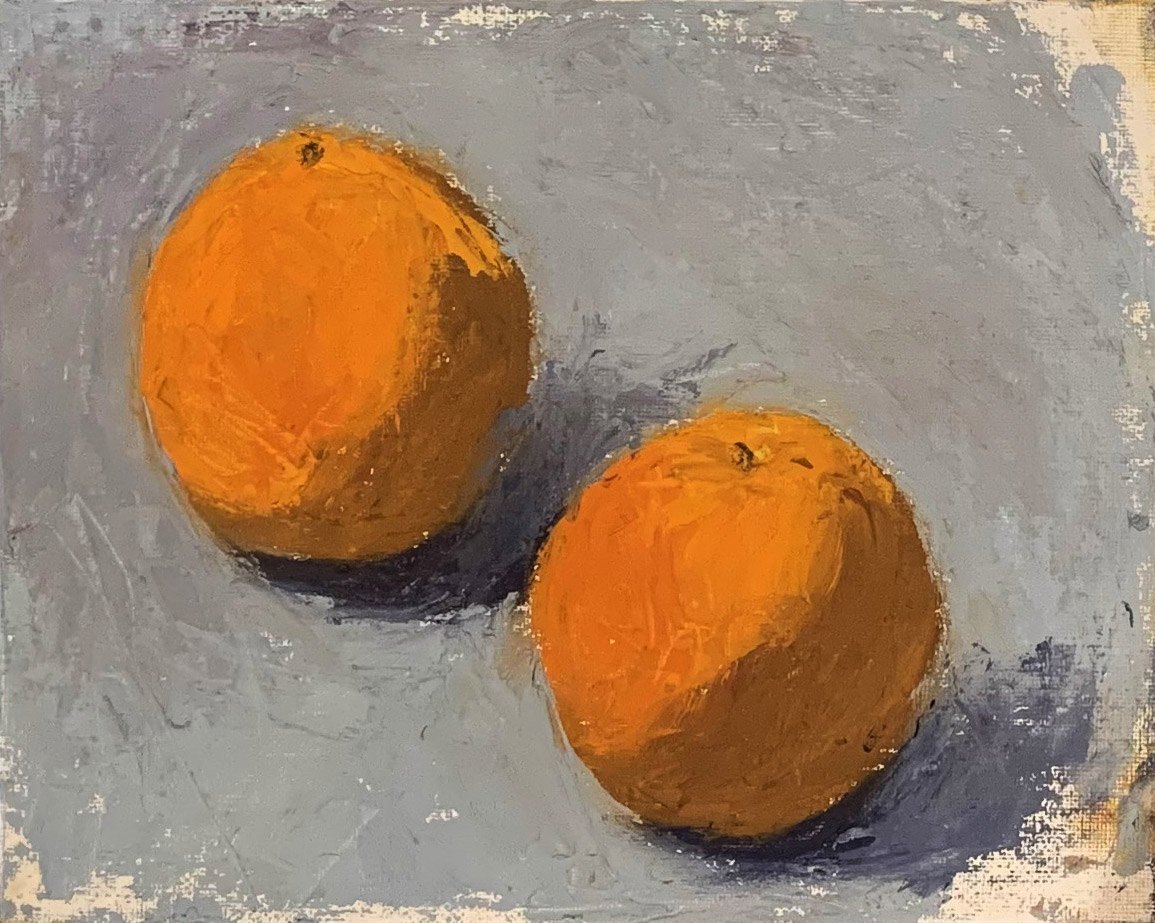 A painting of two clementines