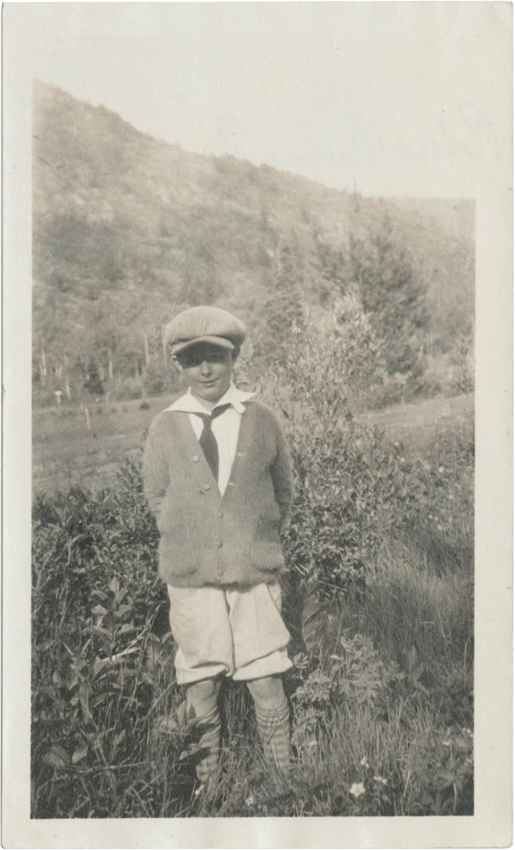 Robert Motherwell standing in a field at age 10, 1925