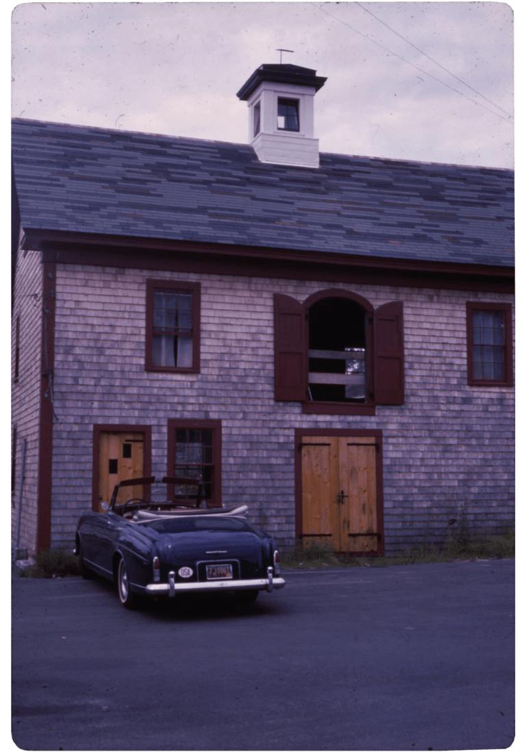 Days Lumberyard with a car parked in front, 1963