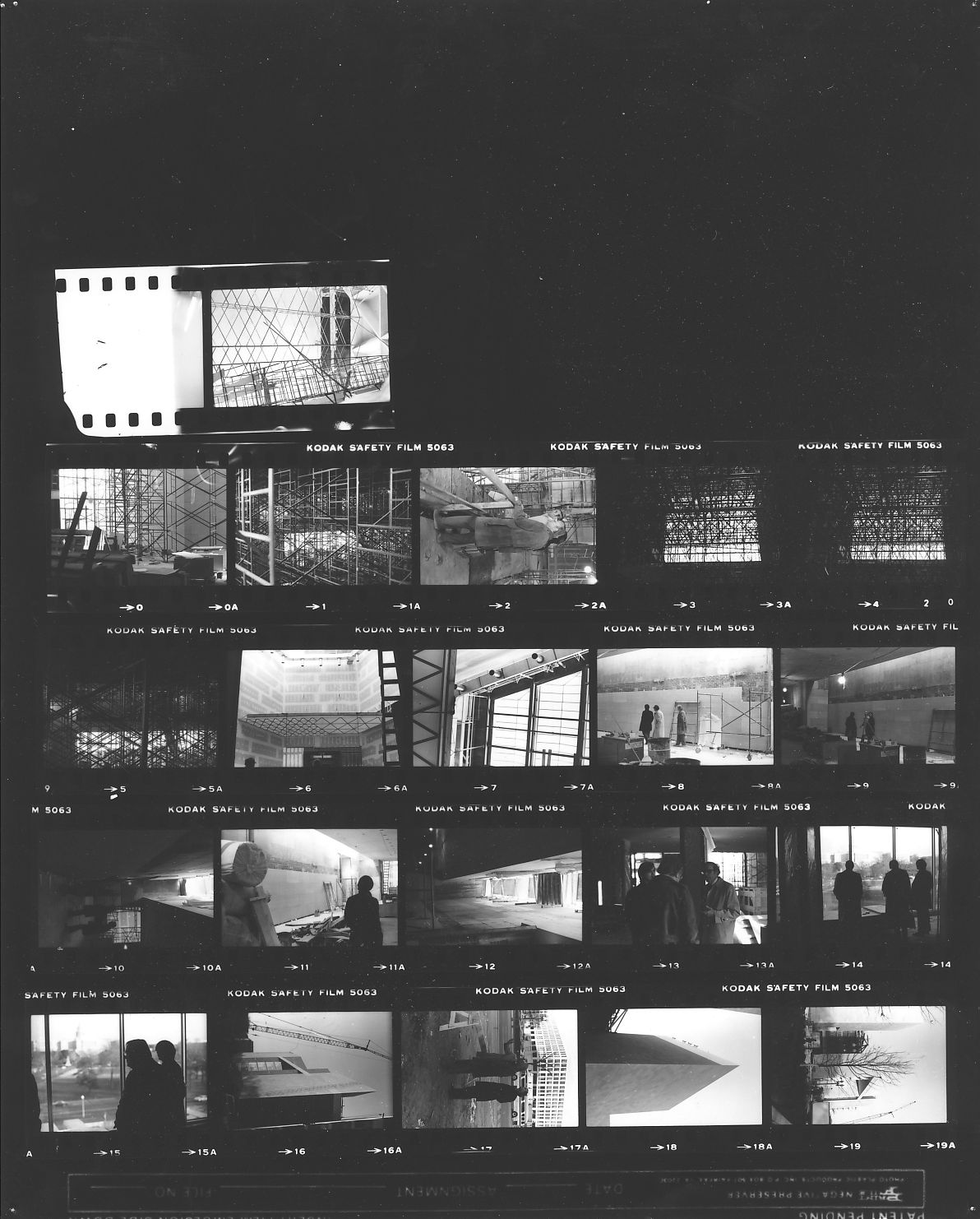 Contact sheet showing Motherwell touring the construction site of the National Gallery of Art East Wing, Washington, D.C.