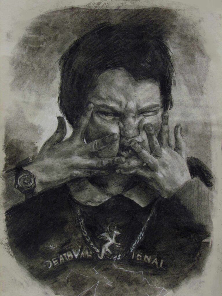 A charcoal drawing of a young person scrunching their face