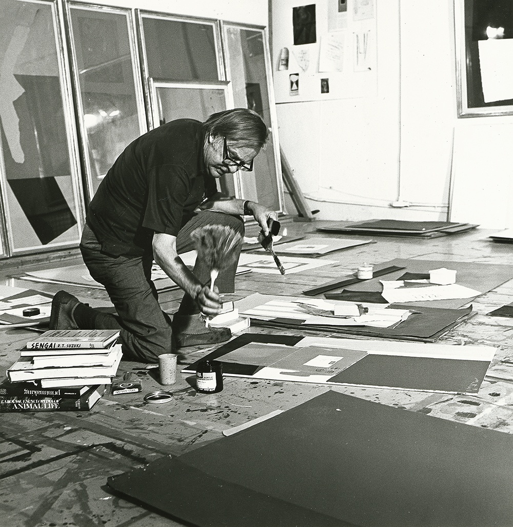Robert Motherwell working on the floor of his studio