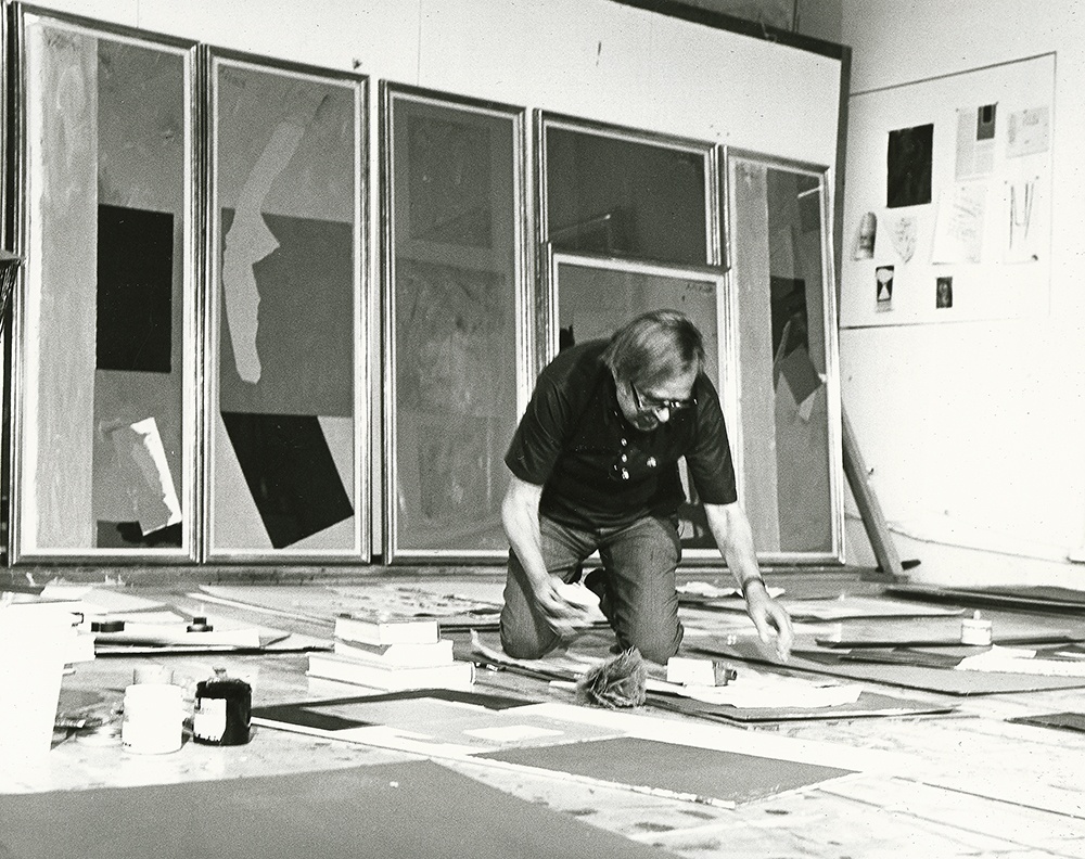 Robert Motherwell working on the floor of his studio