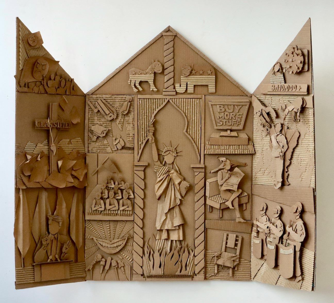 triptych nativity made of cardboard containing imagery from the contemporary American experience