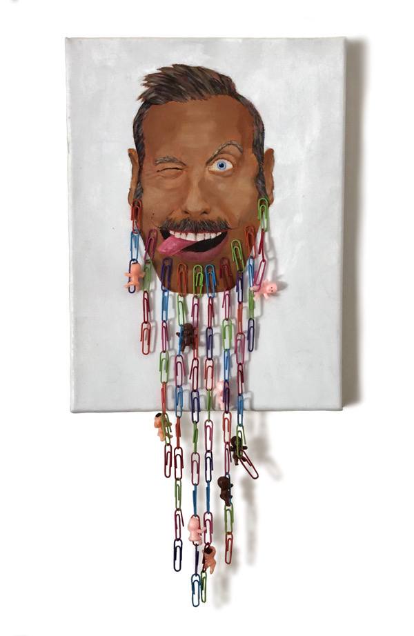 A portrait of a man with a beard constructed of paper clips